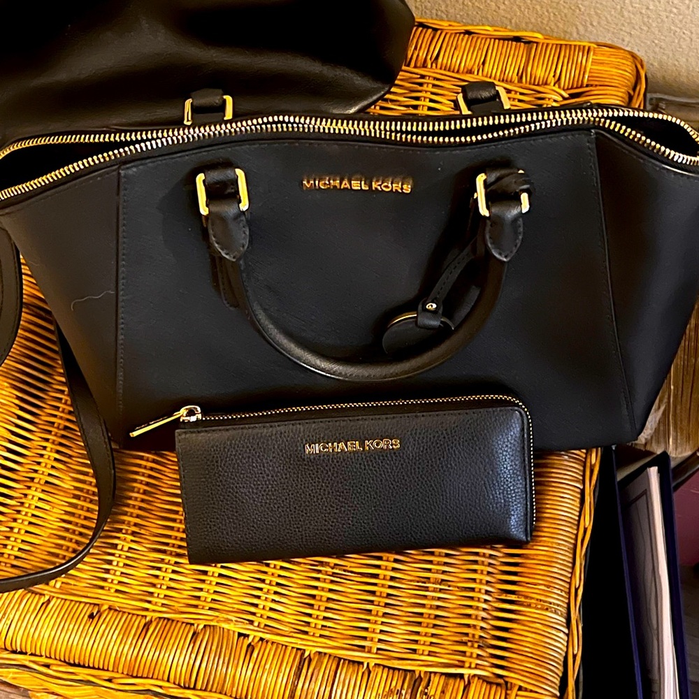 Large cross body duffle with gold hardware. New without tags.